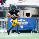 WVU quarterbacks working on ball security, decision-making early this fall